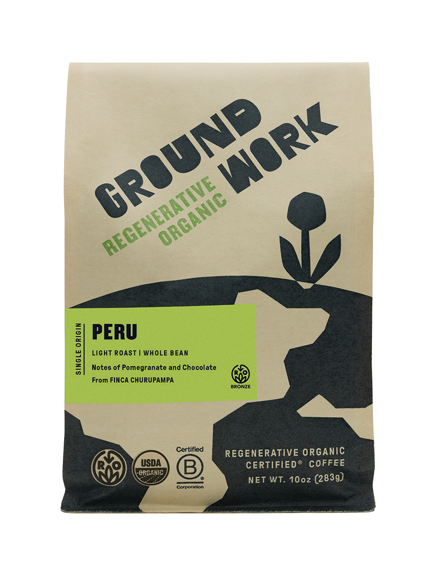 A brown bag of Groundwork Coffee Regenerative Organic Certified® Peru FINCA CHURUPAMPA, featuring green and black text, a flower graphic, certification logos, and notes of pomegranate and chocolate.