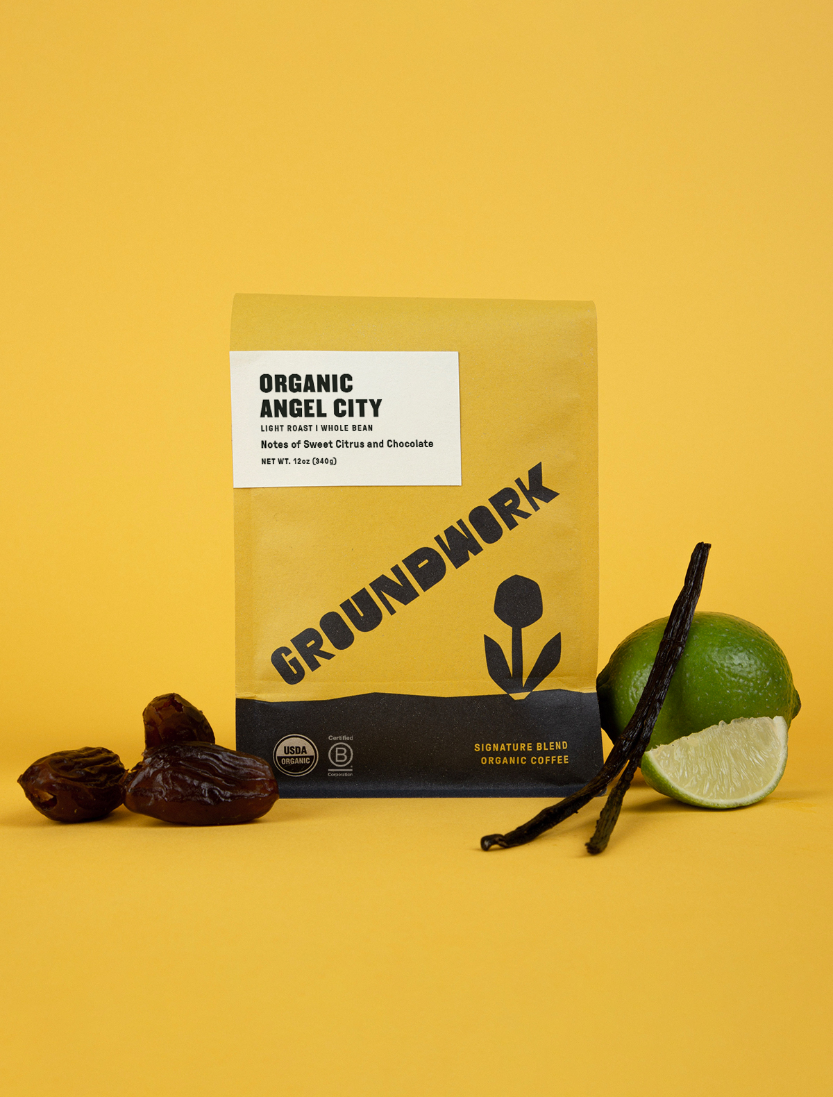 Groundwork Coffee’s Angel City light roast is shown with dates, lime, and vanilla bean, highlighting its sweet citrus notes against a yellow background.