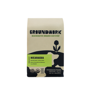 Groundwork Regenerative Organic Certified® Nicaragua coffee bag. Medium roast whole bean, single origin from PROCAFE with tasting notes of chocolate and molasses. Certified USDA Organic, Regenerative Organic Certified®, and B Corporation. Net weight 10 oz (283 g). Beige packaging with black and green design.
