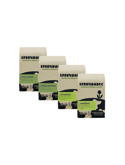 Four Groundwork Coffee bags from the Regenerative Organic Certified® Coffee Bundle, including Honduras and Nicaragua varieties, each in minimalist beige and black packaging.