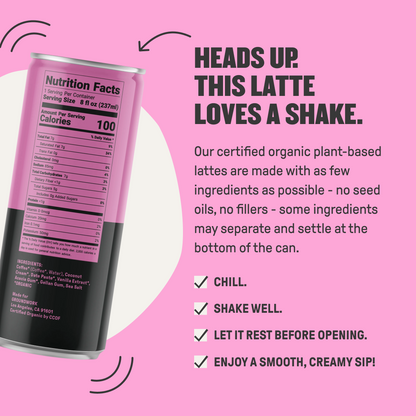 A pink can of Groundwork Coffee Organic Cold Brew Latte, plant-based and low sugar, is tilted on pink. Shake well, let rest, and enjoy a smooth, creamy sip.