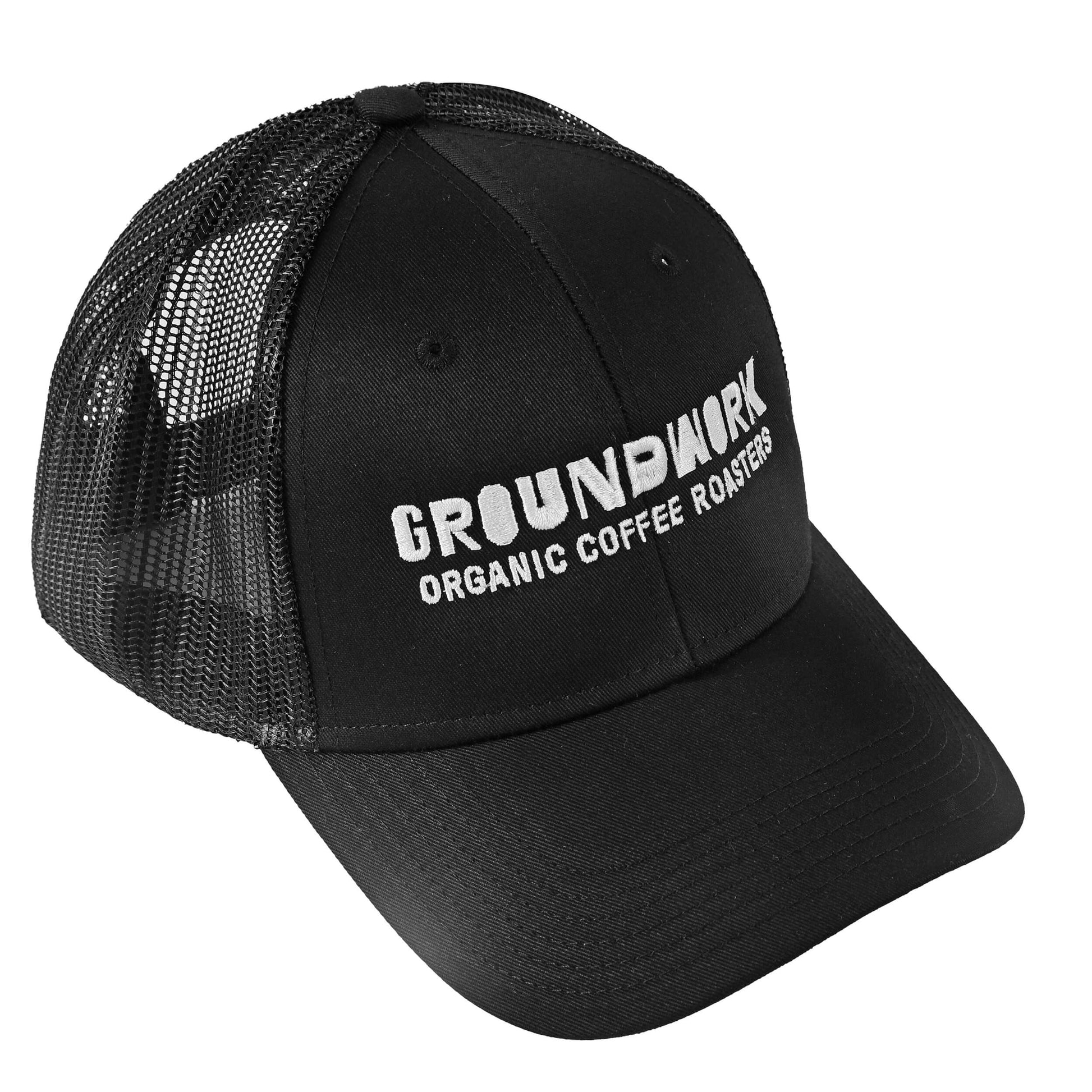The black Groundwork Trucker Hat by Groundwork Coffee features a mesh back and white "GROUNDWORK ORGANIC COFFEE ROASTERS" embroidered on the front.