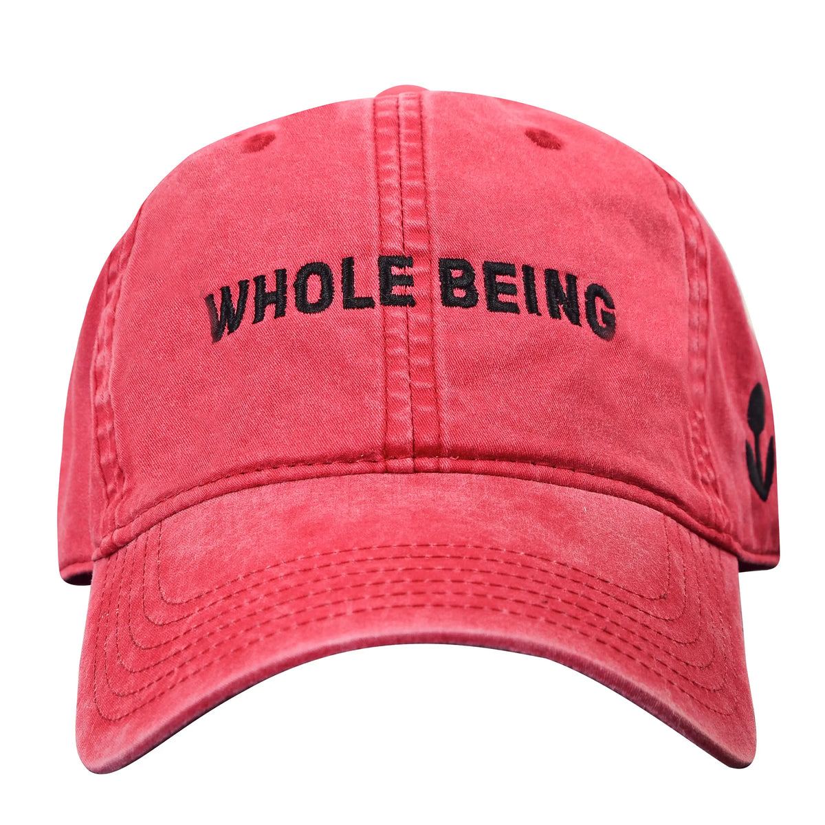 The Whole Being Dad Hat by Groundwork Coffee: red garment-dyed cotton, black “WHOLE BEING” front embroidery, small black side symbol.