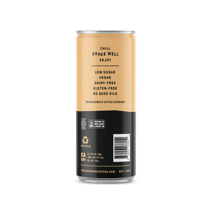 A tall can of Groundwork Coffee Organic Cold Brew Latte with a beige and black label: low sugar, vegan, dairy-free, gluten-free, no seed oils; chill, shake well, and enjoy.
