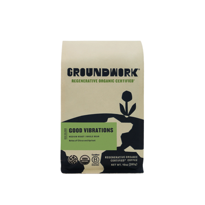 A bag of Groundwork Coffee Store's Regenerative Organic Certified® Good Vibrations whole bean coffee, medium roast with citrus and apricot notes, on a plain background.